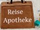Koffer mit Schriftzug Reiseapotheke